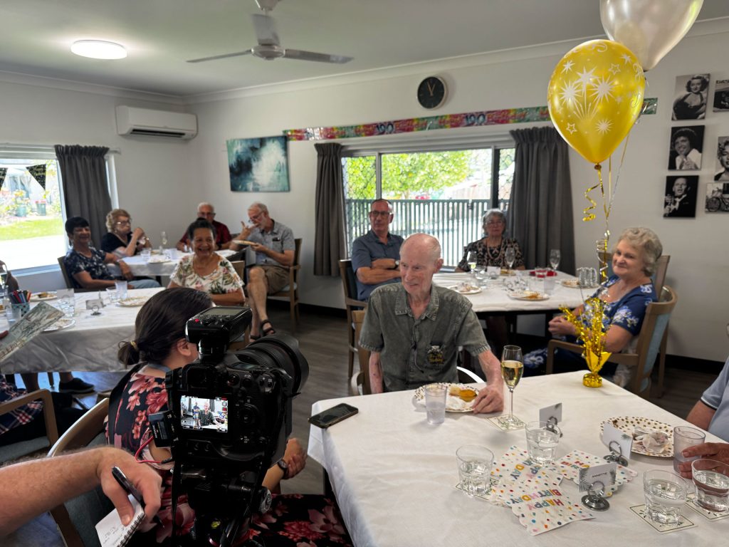 Centacare FNQ's Social Wellbeing Hub celebrated Air Force veteran John Johnston's 100th birthday with music, friendship and community connection at Holloways Beach in Cairns
