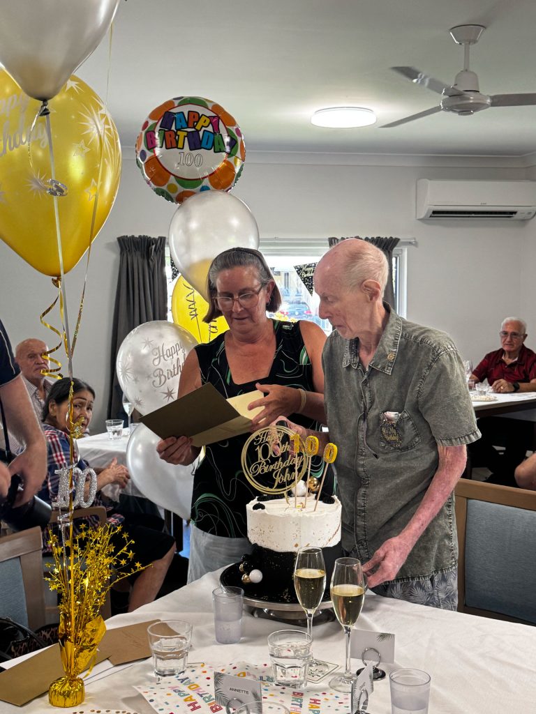 Centacare FNQ's Social Wellbeing Hub celebrated Air Force veteran John Johnston's 100th birthday with music, friendship and community connection at Holloways Beach in Cairns